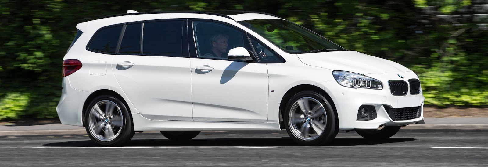 2018 bmw 2 series gran tourer white driving side profile