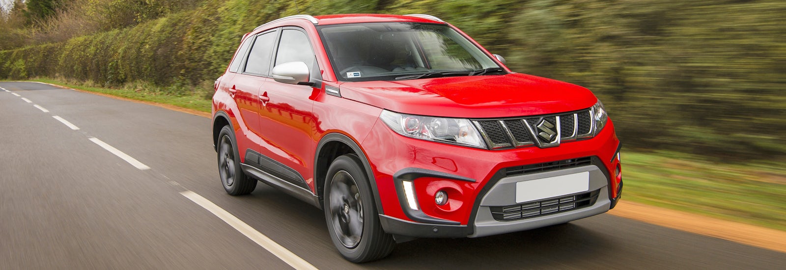 2018 suzuki vitara red driving front
