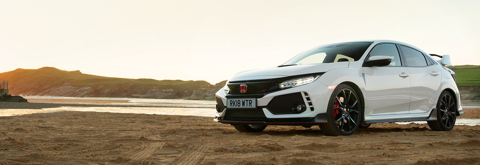Championship White Honda Civic Type R parked, viewed from the front